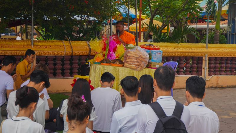 offerings for a monk at Pchum Ben Festival from Phare Ponleu Selpak