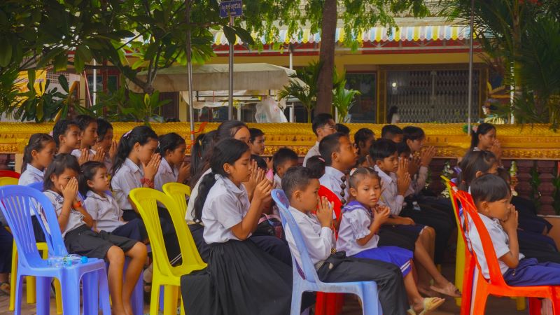 Students praying at a temple in Battambang, Cambodia