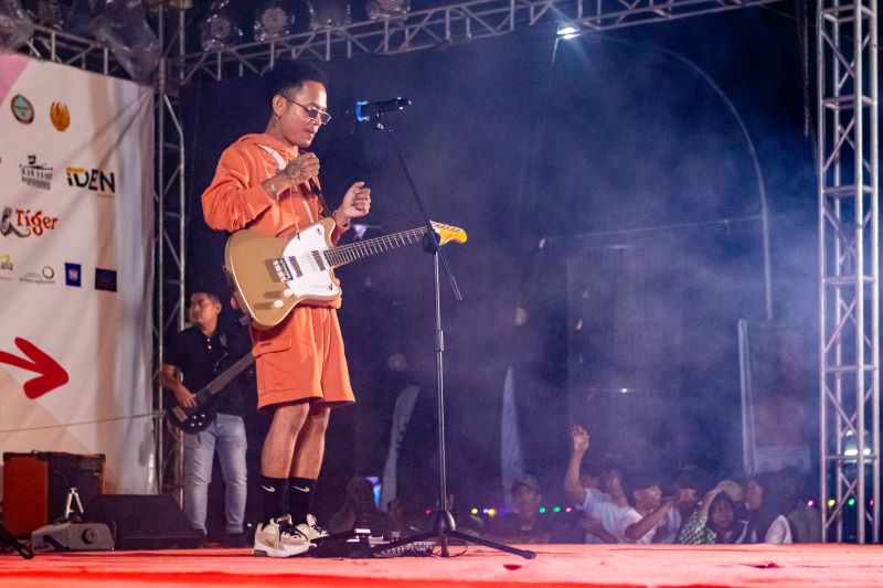 Vanthan playing at a concert in Battambang, Cambodia