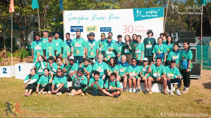 All of the participating cyclists from the Sangker River Run posing on the campus of Phare Ponleu Selpak
