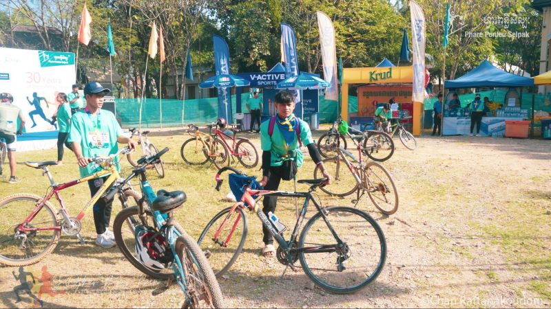 Cyclists after completing the Sangker River Run in Battambang, Cambodia
